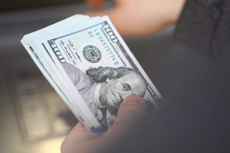 Close Up Dollars, Hand Holds Bundle Banknotes