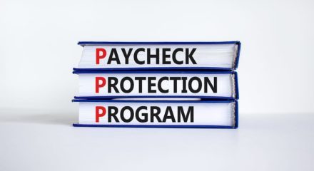 PPP, paycheck protection program symbol. Concept words PPP, paycheck protection program on books on a beautiful white background. Business, PPP