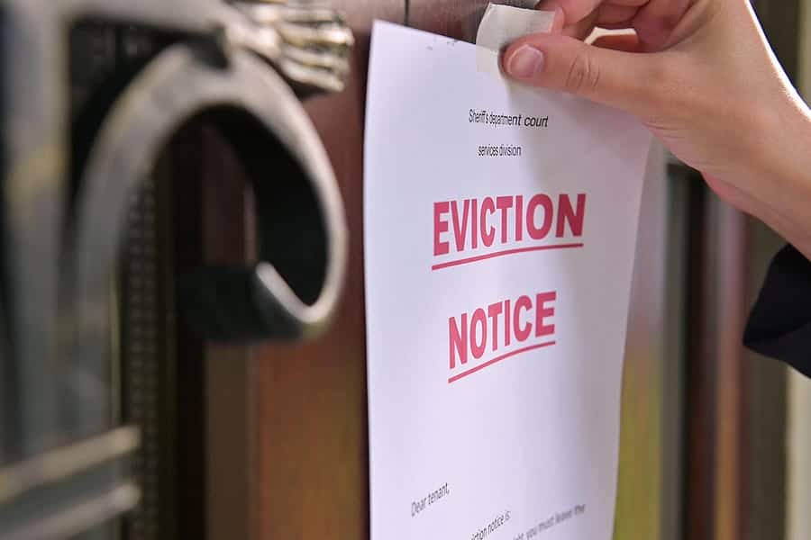 Close-up of a tenants eviction notice gluing to the door