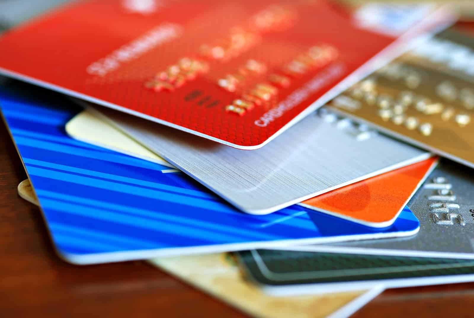 Stack of credit cards - combining credit card debt with mortgage