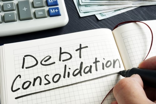 debt consolidation written on noteapad