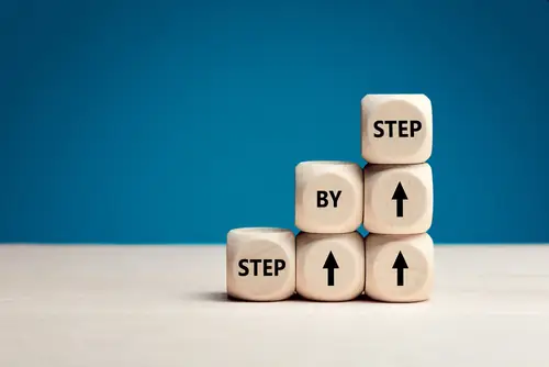 dice stacked up showing steps
